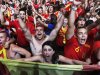Spanish soccer fans celebrate their victory in the Euro 2012 soccer championship semifinal match between Spain and Portugal at the Fan Zone in Madrid, Spain, Wednesday, June 27, 2012. Spain beat Portugal 4-2 in a penalty shootout on Wednesday to reach the final of Euro 2012. (AP Photo/Andres Kudacki)