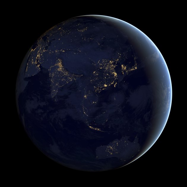 A NASA Earth Observatory handout of a composite image of Asia and Australia at night, assembled from data acquired by the Suomi NPP satellite in April and October 2012