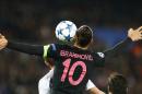 PSG's Zlatan Ibrahimovic heads the ball during the Champions League Group A soccer match between PSG and FC Shakhtar Donetsk at the Parc des Princes stadium in Paris, Tuesday, Dec. 8, 2015. (AP Photo/Francois Mori)
