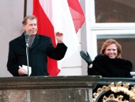 FILE - President Vaclav Havel and his wife Dagmar wave to the crowd of well-wishers from the balcony of Prague Castle after Havel was sworn in for the second term as president of the Czech Republic in this Feb. 2, 1998 file photo. Havel, the dissident playwright who wove theater into politics to peacefully bring down communism in Czechoslovakia and become a hero of the epic struggle that ended the Cold War, died Sunday Dec. 18, 2011 in Prague. He was 75. (AP Photo/Tomas Turek,CTK)