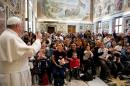 In this photo released by Vatican newspaper L'Osservatore Romano, Pope Francis delivers his blessing during a meeting with the Italian pro-life movement, at the Vatican Friday, April 11, 2014. (AP Photo/L'Osservatore Romano)