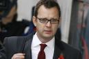 Andy Coulson arrives at The Old Bailey law court in London, Thursday, Oct. 31, 2013. Former News of the World national newspaper editors Rebekah Brooks and Andy Coulson went on trial Monday, along with several others, on charges relating to the hacking of phones and bribing officials while they were employed at the now closed tabloid paper. (AP Photo/Kirsty Wigglesworth)