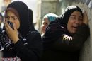 Palestinian relatives of Hamas militant mourn during funeral in Gaza City