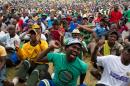 South Africa's platinum mine workers stage a protest after they rejected a fresh wage offer at a public meeting in Marikana on January 30, 2014