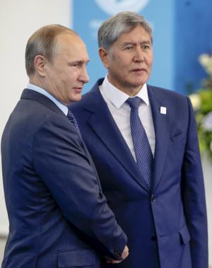 Russia&#39;s President Putin shakes hands with Kyrgyzstan&#39;s &hellip;