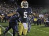 Notre Dame quarterback Everett Golson celebrated after scoring the winning touchdown in the the third overtime period against Pittsburgh in an NCAA college football game in South Bend, Ind., Saturday, Nov. 3, 2012. Dame defeated Pittsburgh 29-26 in triple overtime. (AP Photo/Michael Conroy)