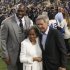 Los Angeles Dodgers owner Magic Johnson, left, Rachel Robinson, widow of baseball player Jackie Robinson, center, and actor Harrison Ford pose for photos during a Jackie Robinson Day ceremony before a baseball game against the San Diego Padres in Los Angeles, Monday, April 15, 2013. (AP Photo/Jae C. Hong)