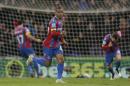 Crystal Palace's Jason Puncheon celebrates after scoring a goal during the English Premier League soccer match between Crystal Palace and Manchester City at Selhurst Park Stadium, London, Monday, April 6, 2015. (AP Photo/Tim Ireland)