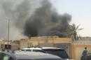 Smoke rises after a car exploded near a Shi'ite mosque in Saudi Arabia's Dammam