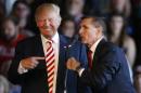 Donald Trump and Michael Flynn speak at a rally in Colorado in October