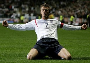 England&#39;s David Beckham celebrates his goal against Azerbaijan in 2005. (REUTERS)