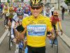 FILE - In this July 24, 2005, file photo, overall leader Lance Armstrong signals seven for his seventh straight win in the Tour de France cycling race as he pedals during the 21st and final stage of the race between Corbeil-Essonnes, south of Paris, and the French capital. The superstar cyclist, whose stirring victories after his comeback from cancer helped him transcend sports, chose not to pursue arbitration in the drug case brought against him by the U.S. Anti-Doping Agency. That was his last option in his bitter fight with USADA and his decision set the stage for the titles to be stripped and his name to be all but wiped from the record books of the sport he once ruled.   (AP Photo/Peter Dejong, File)