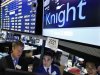 Barclays Capital specialists work at the post that trades Knight Capital on the floor of the New York Stock Exchange