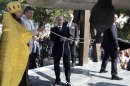 Russian President Putin and Ukrainian President Yanukovich ring a newly installed bell during a service at the Saint Vladimir Cathedral near the Crimean port of Sevastopol