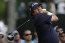 Jason Dufner watches his tee shot on the third hole during the final round of the PGA Colonial golf tournament in Fort Worth, Texas, Sunday, May 25, 2014. (AP Photo/LM Otero)
