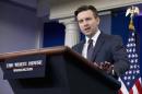 White House press secretary Josh Earnest speaks during the daily news briefing at the White House, in Washington, Thursday, Feb. 4, 2016. Earnest discussed that the number of Islamic State group fighters has dropped in Iraq and Syria, but is rising in Libya, and other topics. (AP Photo/Carolyn Kaster)
