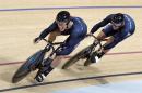 Sam Webster of New Zealand, left, and teammate Edward Dawkins compete in the men's team sprint qualifying at the Rio Olympic Velodrome during the 2016 Summer Olympics in Rio de Janeiro, Brazil, Thursday, Aug. 11, 2016. (AP Photo/Pavel Golovkin)