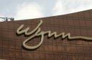 A worker stands atop the Wynn resorts in Macau on September 5, 2006