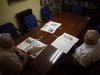 Pensioners read newspapers at a seniors centre in Ronda