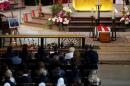 People attend a funeral service to slain French parish priest Father Jacques Hamel at the Cathedral in Rouen