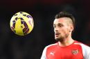 Arsenal's French defender Mathieu Debuchy eyes the ball during the English Premier League football match between Arsenal and Newcastle United at the Emirates Stadium in London on December 13, 2014