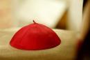 A cardinal's cap lies on a chair during a ceremony in St. Peter's Basilica presided over by Pope Joh..