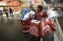 File of shoppers leaving a Target store with their purchases in Chicago