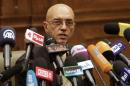 Constituent Assembly spokesman Mohamed Salmawy speaks at a news conference at the Shura Council in Cairo