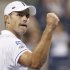 Roddick of the U.S. celebrates a point in the third set against Tomic of Australia at the US Open men's singles tennis tournament in New York