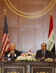 U.S. Vice President Joseph Biden, left, and Iraqi Prime Minister Nouri al-Maliki, right, hold a joint news conference in Baghdad, Iraq, Wednesday, Nov. 30, 2011. Biden said Wednesday that his trip to Baghdad ahead of the U.S. military pullout will mark a new beginning between Iraq and the United States, but already protests in Iraq against his visit are demonstrating the difficulties the relationship will face. (AP Photo/ Khalid Mohammed)