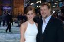 British actress Emma Watson and Australian actor Russell Crowe pose for photographers as they arrive at the UK premiere of Noah in Leicester Square, London, Monday March 31, 2014. (Photo by Jon Furniss/Invision/AP)