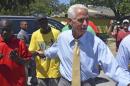 Former Florida Governor Charlie Crist greets supporters outside the North Miami Public Library in Miami in this file photo