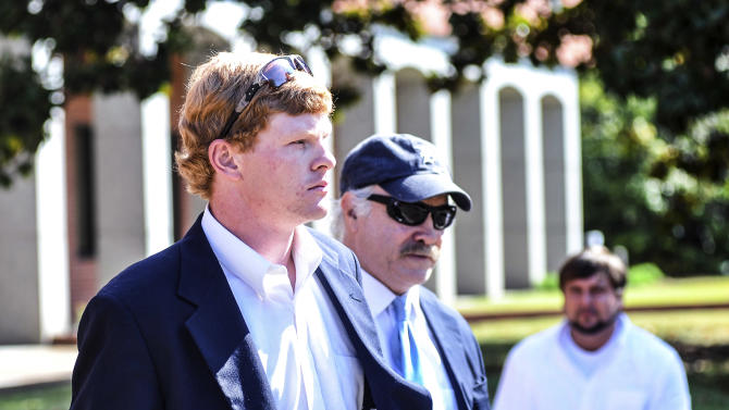 Former University of Mississippi student Graeme Phillip Harris, left, with his attorney David Hill, leaves federal court after being sentenced, Thursday, Sept. 17, 2015 in Oxford, Miss. Harris, a former University of Mississippi student who admitted helping place a noose on a statue of a civil rights activist is going to prison. U.S. District Judge Michael P. Mills sentenced Graeme Phillip Harris on Thursday to six months in prison beginning Jan. 4, followed by 12 months&#39; supervised release. (Bruce Newman/The Oxford Eagle via AP)  NO SALES; MANDATORY CREDIT