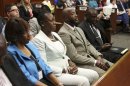 Trayvon Martin's parents Sybrina Fulton and Tracy Martin sit in court as Judge Debra Nelson reads instructions to the jury during George Zimmerman trial in Seminole circuit court in Sanford
