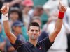 Serbia's Novak Djokovic thumbs up after defeating France's Nicolas Devilder during their third round match in the French Open tennis tournament at the Roland Garros stadium in Paris, Friday, June 1, 2012. (AP Photo/Christophe Ena)