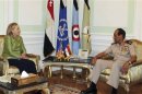 Egyptian military chief Field Marshal Tantawi meets with U.S. Secretary of State Clinton at the Defence Ministry in Cairo