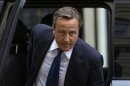 Britain's Prime Minister David Cameron arrives at Number 10 Downing Street in London