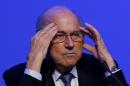 FIFA President Joseph Blatter attends a news conference following the FIFA Congress in Sao Paulo, Brazil, Wednesday, June 11, 2014. Brazil is hosting the 2014 soccer World Cup starting June 12. (AP Photo/Julio Cortez)