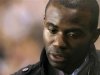 Former Bolton Wanderers player Fabrice Muamba cries as he returns to White Hart Lane for the first time since suffering almost fatal heart failure during a match there earlier this year in London