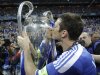 Chelsea's Frank Lampard kisses the trophy at the end of the Champions League final soccer match between Bayern Munich and Chelsea in Munich, Germany Saturday May 19, 2012.  Chelsea's Didier Drogba scored the decisive penalty in the shootout as Chelsea beat Bayern Munich to win the Champions League final after a dramatic 1-1 draw on Saturday. (AP Photo/Frank Augstein)