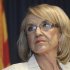 Arizona Governor Jan Brewer listens to a question from a media member about the Supreme Court's decision on SB1070 in Phoenix.