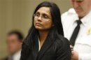 Annie Dookhan, a former chemist at the Hinton State Laboratory Institute, listens to the judge during her arraignment at Brockton Superior Court in Brockton, Massachusetts