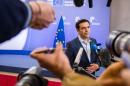 Greek Prime Minister Alexis Tsipras speaks with the media after a meeting of eurozone heads of state at the EU Council building in Brussels on Monday, July 13, 2015. A summit of eurozone leaders reached a tentative agreement with Greece on Monday for a bailout program that includes "serious reforms" and aid, removing an immediate threat that Greece could collapse financially and leave the euro. (AP Photo/Geert Vanden Wijngaert)
