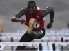 Hansle Parchment runs during the men's 110 meters hurdles semi finals at the Jamaican Olympic trials in Kingston city