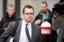 Former News of the World editor and Downing Street communications chief Andy Coulson arrives at the phone-hacking trial at the Old Bailey court in London on March 17, 2014