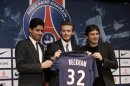 Soccer player Beckham attends a news conference in Paris