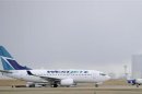 A Westjet Boeing 737-700 takes off at the International Airport in Calgary