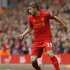 Liverpool's Borini runs with the ball during their English Premier League soccer match against Manchester United in Liverpool