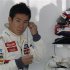 Sauber Formula One driver Kobayashi gets ready for the first practice session of the Indian F1 Grand Prix at the Buddh International Circuit in Greater Noida
