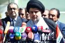 Iraqi Shiite cleric Moqtada al-Sadr during a press conference following a meeting with an independent committee for the formation of a cabinet of technocrats, in the holy city of Najaf, on March 22, 2016